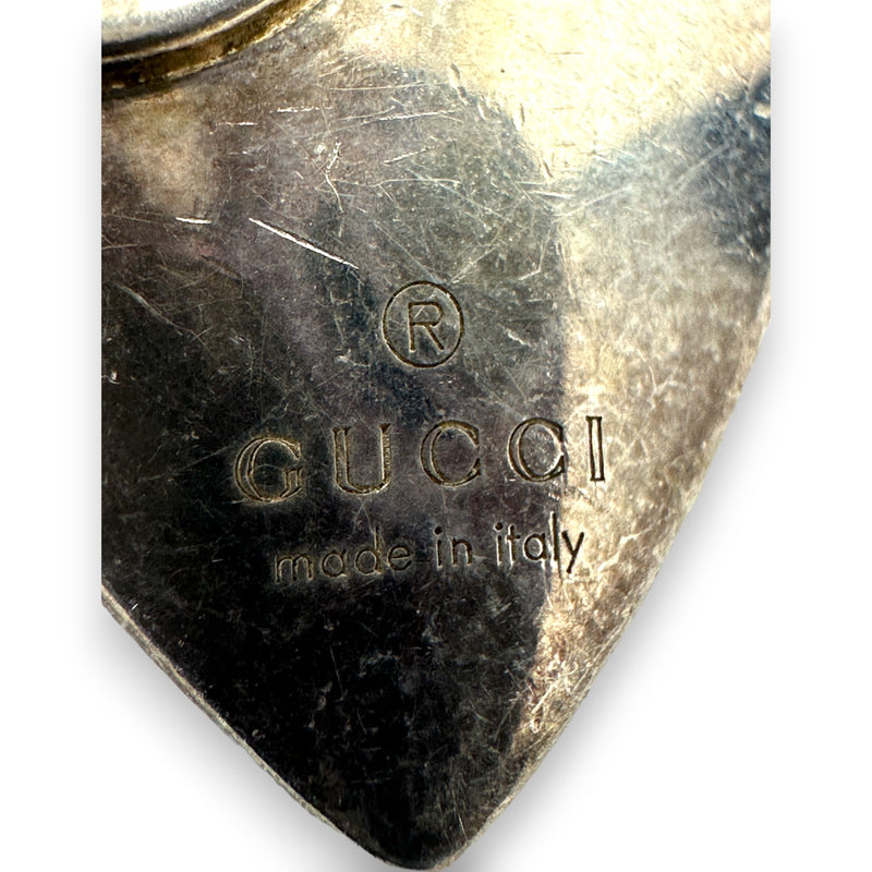 Pulsera Gucci de plata de ley 925 con dije de corazón G y logotipo de 19 cm. Fabricada en Italia.