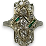 1920s Art Deco Era Solid 18kt 23.5mm Long Antique Cut Diamond Dinner Ring with 2 Heart Settings and Emerald Accents Size 10