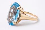 Vintage 1970-80s 14kt Yellow Gold Large Oval Cut Blue Topaz Solitaire Cocktail Ring Size 7