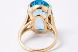 Vintage 1970-80s 14kt Yellow Gold Large Oval Cut Blue Topaz Solitaire Cocktail Ring Size 7