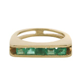 Vintage 1960-80s Solid 18kt Yellow Gold and Tension Set Emerald Row Cocktail Ring Size 7.5
