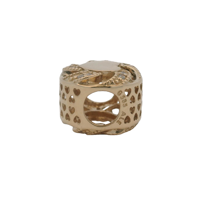 Charm Pandora de corazón con lazo en oro amarillo macizo de 14 kt y circonitas cúbicas