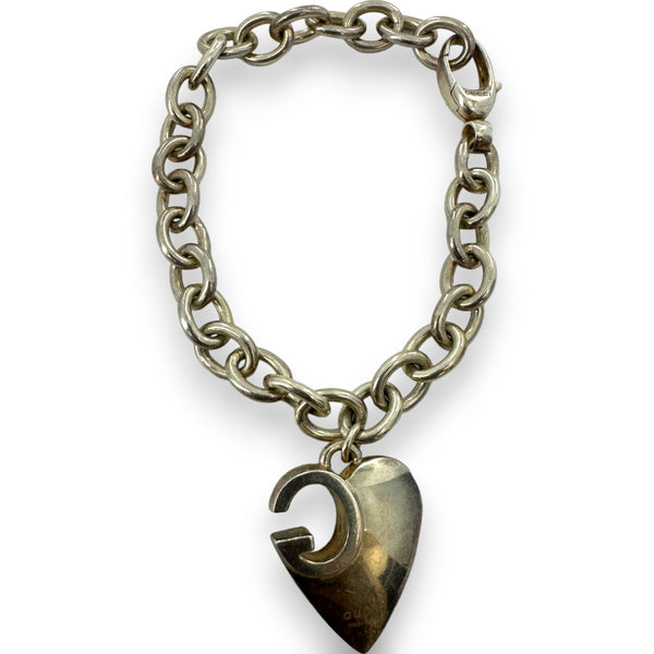 Pulsera Gucci de plata de ley 925 con dije de corazón G y logotipo de 19 cm. Fabricada en Italia.