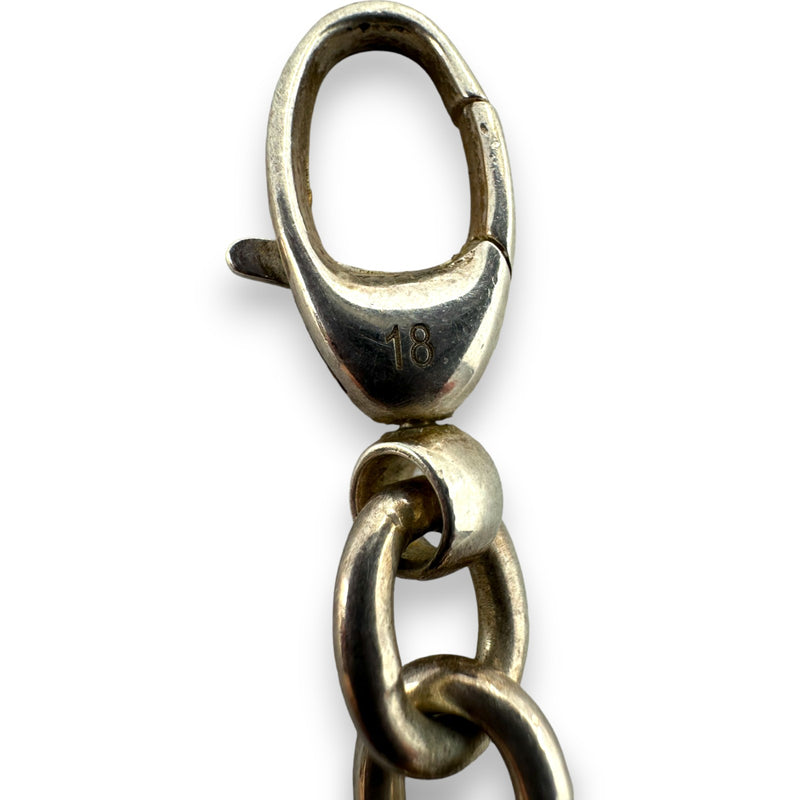 Pulsera Gucci de plata de ley 925 con dije de corazón G y logotipo de 19 cm. Fabricada en Italia.