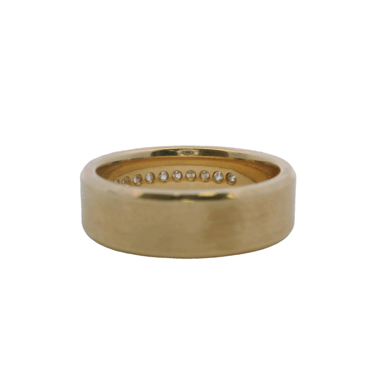 Anillo de oro amarillo de 14 kt de 7 mm y 0,60 cts con diamantes de talla princesa engastados en canal de Blue Nile