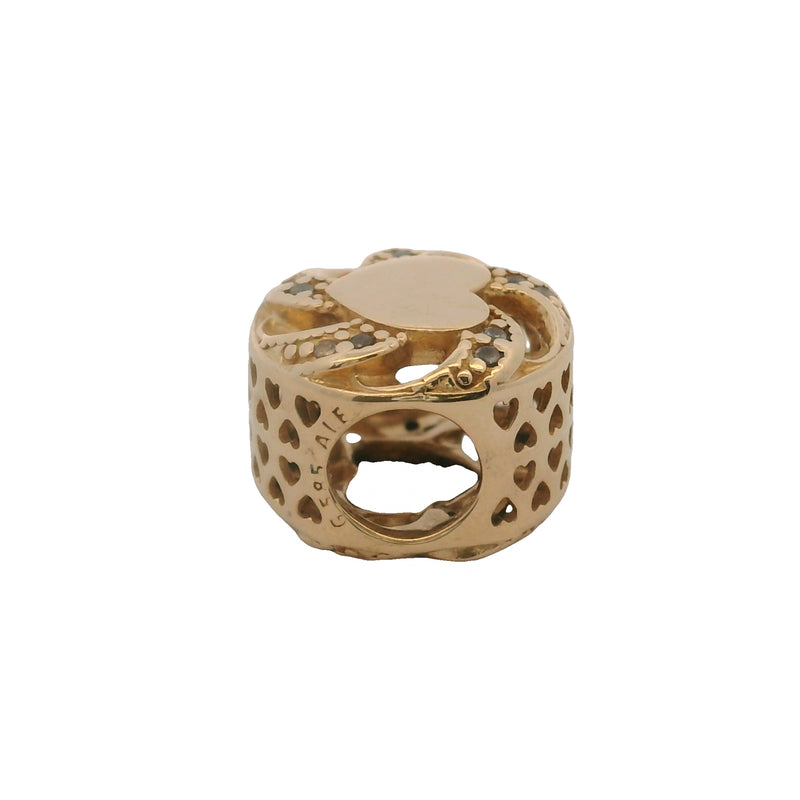 Charm deslizante con espaciador de corazón de cinta de oro amarillo sólido de 14 kt y circonitas (retirado de Pandora)