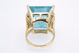 Vintage 1970-80s Solid 14kt Yellow Gold Cocktail Ring with Large 16.7mm Square Step-Cut Aquamarine and 12 Accent Diamonds Size 5.5