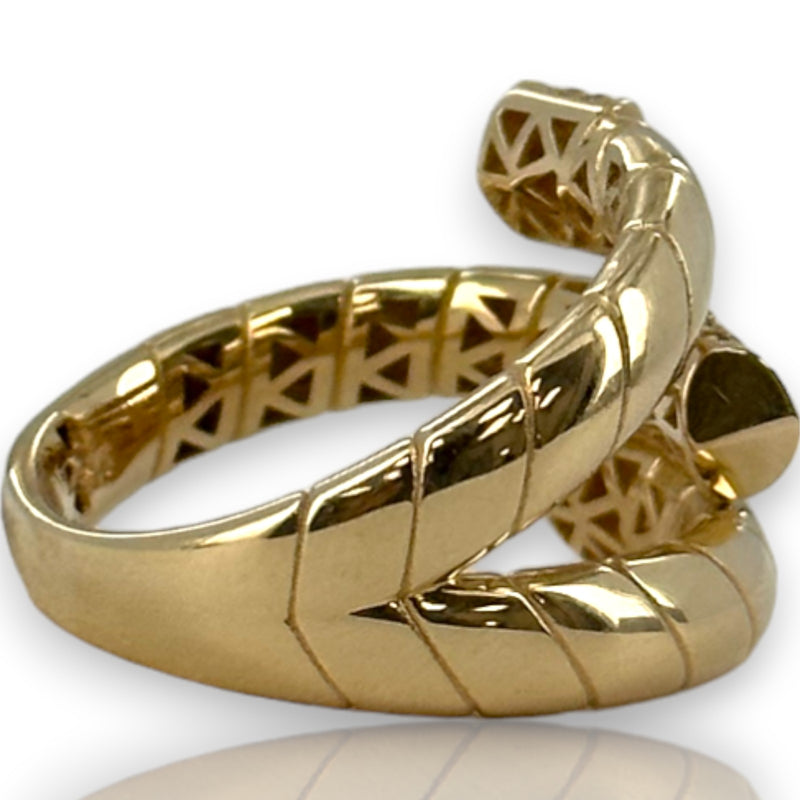 Anillo envolvente estilo cordón con circonitas cúbicas, talla 7,5, oro amarillo de 14 kt.
