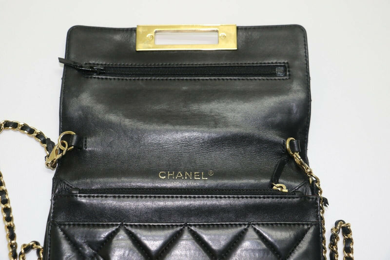 Chanel: Quilted Black Leather Chain Clutch - Flip Lock