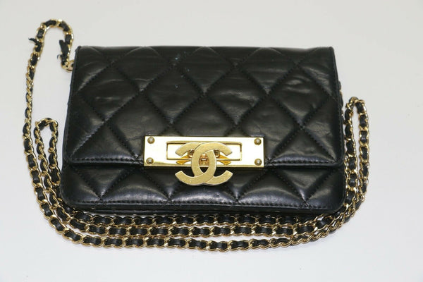 Chanel: Quilted Black Leather Chain Clutch - Flip Lock